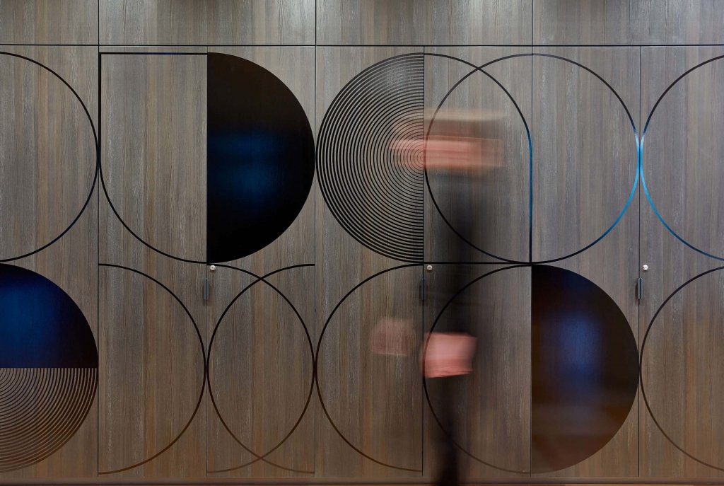 Workplace signage black on timber circular graphic language detail